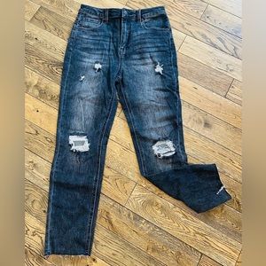 Risen high waisted distressed jeans